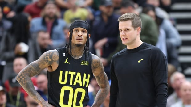 Utah Jazz guard Jordan Clarkson (00) and head coach Will Hardy speak during a break in action against the Los Angeles Lakers in the second quarter at Vivint Arena.