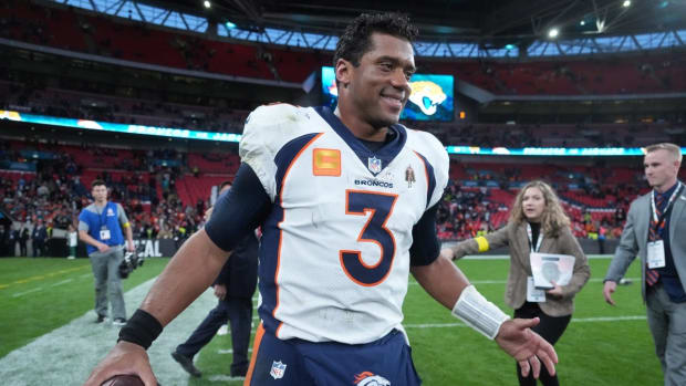 Oct 30, 2022; London, United Kingdom; Denver Broncos quarterback Russell Wilson (3) poses after an NFL International Series game against the Jacksonville Jaguars at Wembley Stadium. The Bronco defeated the Jaguars 21-17. Mandatory Credit: Kirby Lee-USA TODAY Sports