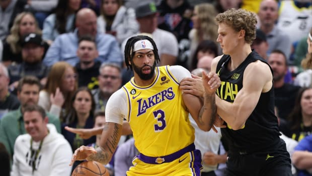 Los Angeles Lakers forward Anthony Davis (3) posts up against Utah Jazz forward Lauri Markkanen (23) in the second quarter at Vivint Arena.
