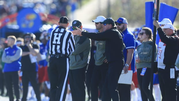 Kansas head coach Lance Leipold argues with referees after a play in the first quarter against Oklahoma State inside David Booth Kansas Memorial Stadium.
