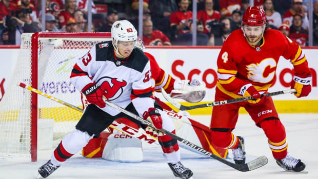 Nov 5, 2022; Calgary, Alberta, CAN; New Jersey Devils left wing Jesper Bratt (63) controls the puck against the Calgary Flames during the first period at Scotiabank Saddledome. Mandatory Credit: Sergei Belski-USA TODAY Sports