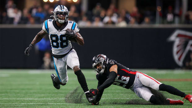 Oct 30, 2022; Atlanta, Georgia, USA; Carolina Panthers wide receiver Terrace Marshall Jr. (88) runs past Atlanta Falcons cornerback Isaiah Oliver (26) in the second half at Mercedes-Benz Stadium.