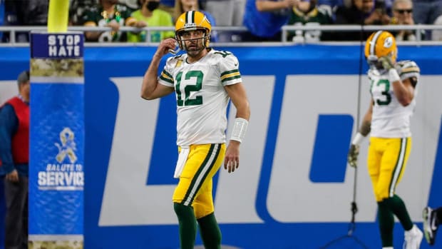 Green Bay Packers quarterback Aaron Rodgers (12) walks off the field after a pass was intercepted by the Detroit Lions during the first half at Ford Field, Nov. 6, 2022.