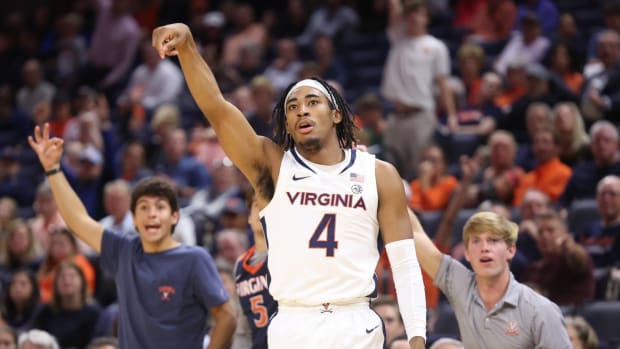 Armaan Franklin shoots a three-pointer during the Virginia men's basketball game against NC Central at John Paul Jones Arena.