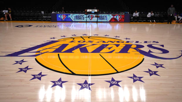 Close-up view of the Lakers logo at center court before a game against the 76ers.