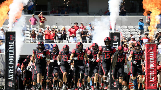 Sep 24, 2022; San Diego, California, USA; San Diego State Aztecs players take the field before the game against the Toledo Rockets at Snapdragon Stadium. Mandatory Credit: Orlando Ramirez-USA TODAY Sports
