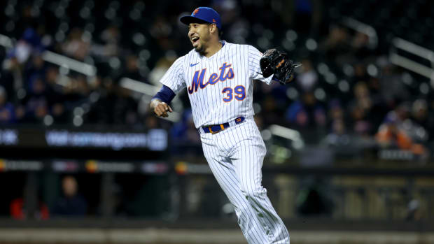 Edwin Díaz reacts to finishing game for the Mets against the Nationals.