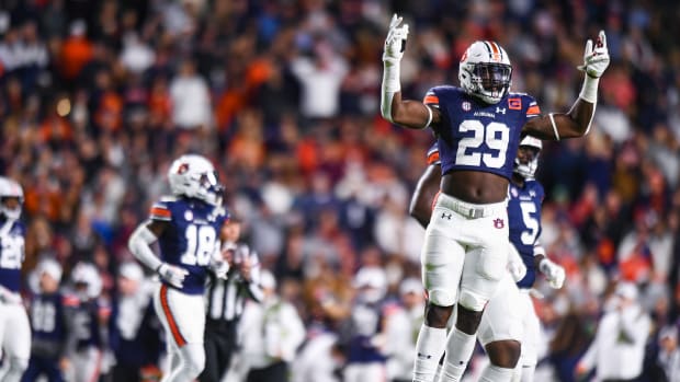 Derick Hall (29) pumps up the crowd during the game between Auburn and Texas A&M at Jordan-Hare Stadium. Grayson Belanger/AU Athletics