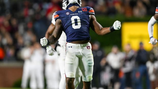 Owen Pappoe (0) celebrates a play during the football game between the Texas A&M Aggies and the Auburn Tigers at Jordan Hare Stadium in Auburn, AL on Saturday, Nov 12, 2022. Todd Van Emst/Auburn Tigers