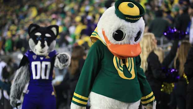 The Husky and Oregon mascots part ways in Eugene.