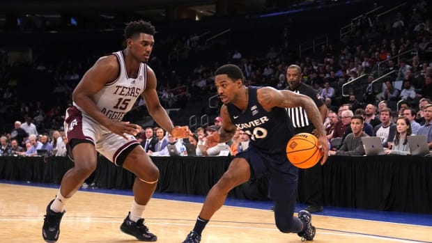 Mar 31, 2022; New York, New York, USA; Xavier Musketeers guard Nate Johnson (10) dribbles the ball against Texas A&amp;M Aggies forward Henry Coleman III (15) during the second half of the NIT college basketball finals at Madison Square Garden. Mandatory Credit: Gregory Fisher-USA TODAY Sports