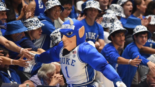 Nov 11, 2022; Durham, North Carolina, USA; The Duke Blue Devils mascot gives high fives to the fans in the second half at Cameron Indoor Stadium. Mandatory Credit: Rob Kinnan-USA TODAY Sports