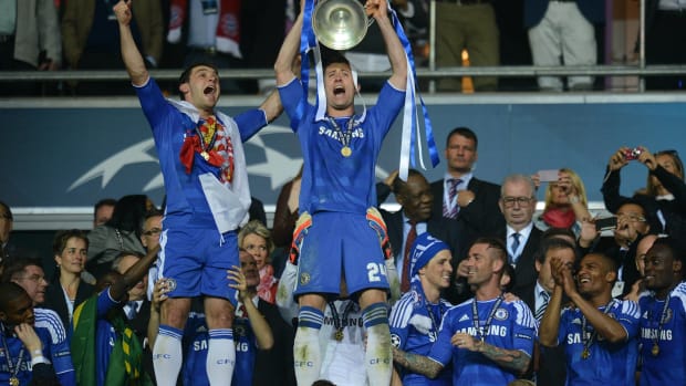 Gary Cahill pictured lifting the UEFA Champions League trophy after Chelsea's victory over Bayern Munich in the 2011/12 final