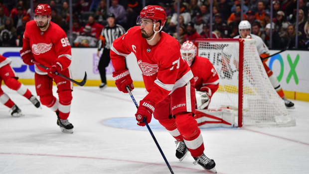 Nov 15, 2022; Anaheim, California, USA; Detroit Red Wings center Dylan Larkin (71) controls the puck against the Anaheim Ducks during the second period at Honda Center. Mandatory Credit: Gary A. Vasquez-USA TODAY Sports