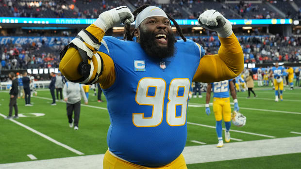 Chargers defensive tackle Linval Joseph (98) celebrates after the game against the Broncos at SoFi Stadium.