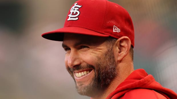Cardinals first baseman Paul Goldschmidt smiles at his teammates.