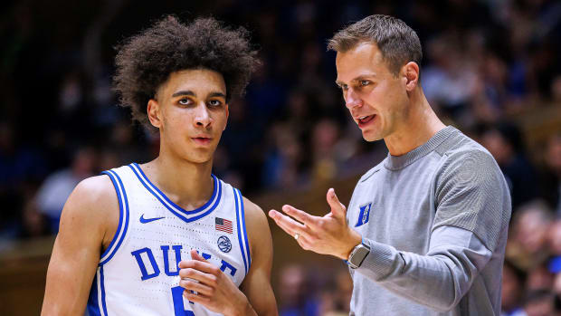 Duke’s Tyrese Proctor talks to coach Jon Scheyer