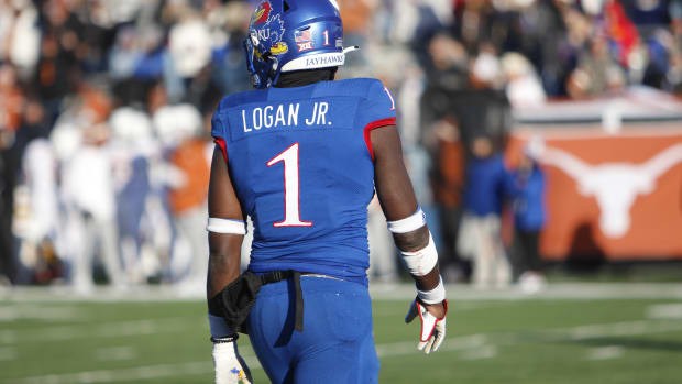 Kenny Logan Jr. awaits the start of a play  in the first half against the Texas Longhorns in David Booth Kansas Memorial Stadium on November 19, 2022.