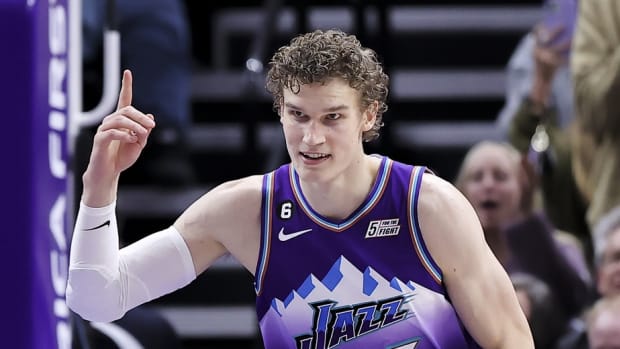 Utah Jazz forward Lauri Markkanen (23) reacts after a dunk against the Phoenix Suns in the second half at Vivint Arena.