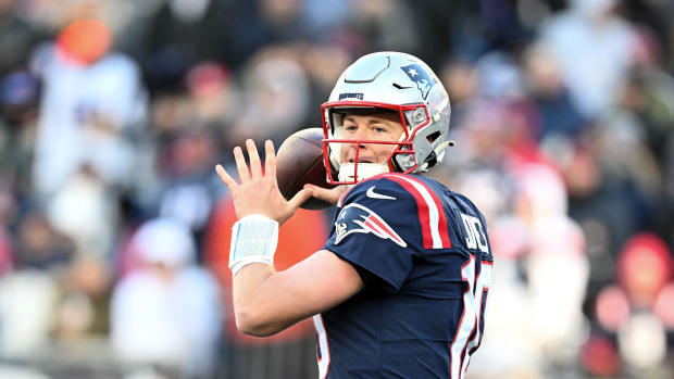 Nov 20, 2022; Foxborough, Massachusetts, USA; New England Patriots quarterback Mac Jones (10) prepares to throw the ball against the New York Jets during the first half at Gillette Stadium.