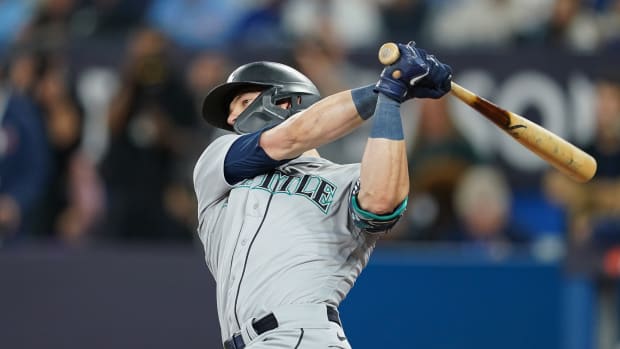 Mariners outfielder Mitch Haniger hits a double against the Blue Jays. (2022)