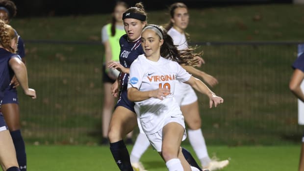 Maggie Cagle dribbles the ball forward during the Virginia women's soccer match against Fairleigh Dickinson at Klockner Stadium.