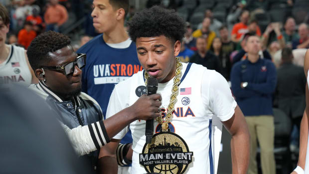Virginia Cavaliers guard Reece Beekman (2) was named Most Valuable Player of the Continental Tire Main Event Championship after the Cavaliers defeated the Illinois Fighting Illini 70-61 at T-Mobile Arena.
