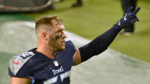 Former Titans linebacker Will Compton waves to the crowd after a game in 2020.