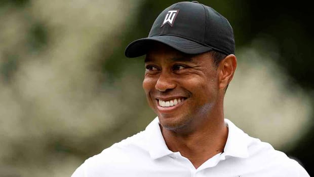 Tiger Woods smiles during the 2022 Masters.