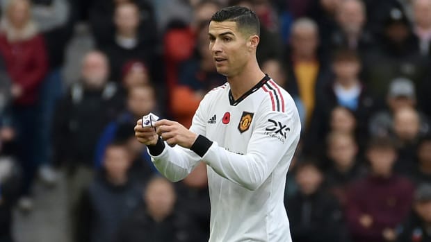 Manchester United’s Cristiano Ronaldo holds the captain armband during a match.