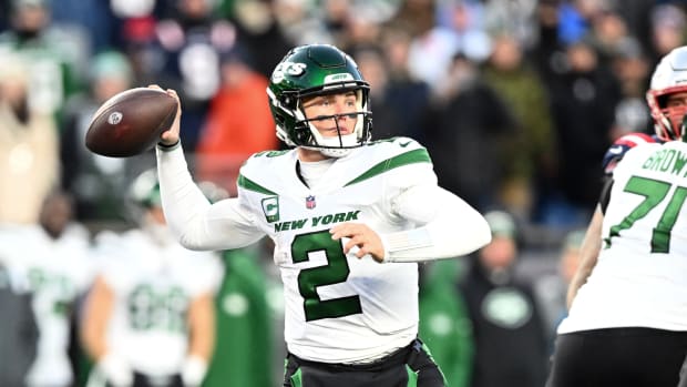 New York Jets QB Zach Wilson throws pass against New England Patriots