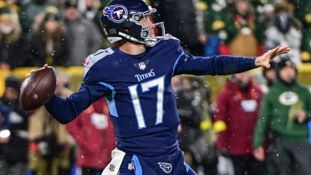 Tennessee Titans quarterback Ryan Tannehill (17) throws a pass in the first quarter during game against the Green Bay Packers at Lambeau Field.