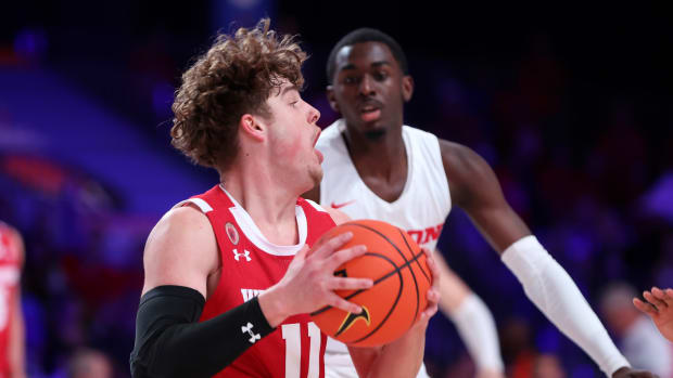 Nov 23, 2022; Paradise Island, BAHAMAS; Wisconsin Badgers guard Max Klesmit (11) looks to pass during the first half against the Dayton Flyers at Imperial Arena. Mandatory Credit: Kevin Jairaj-USA TODAY Sports