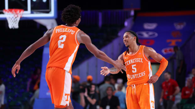 Nov 24, 2022; Paradise Island, BAHAMAS; Tennessee Volunteers forward Julian Phillips (2) celebrates with Tennessee Volunteers guard Zakai Zeigler (5) in overtime against the USC Trojans at Imperial Arena.