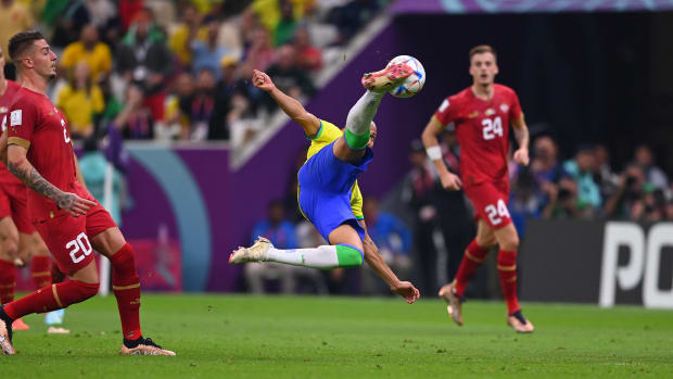 Richarlison pictured scoring for Brazil against Serbia with a spectacular acrobatic volley at the 2022 FIFA World Cup