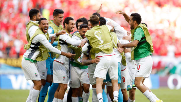 Iran celebrates a goal against Wales