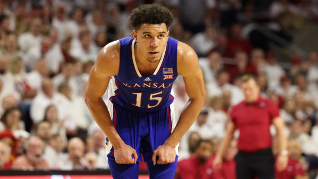 Feb 4, 2023; Ames, Iowa, USA; Kansas Jayhawks guard Kevin McCullar Jr. (15) reacts during a game against the Iowa State Cyclones at James H. Hilton Coliseum. Mandatory Credit: Reese Strickland-USA TODAY Sports  