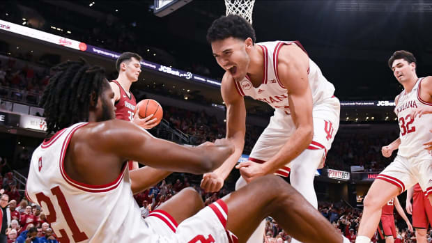 Indiana Hoosiers guard Anthony Leal (3) celebrates with Indiana Hoosiers forward Mackenzie Mgbako (21) after a basket and a foul from Mgbako during the game against Harvard in Gainbridge Fieldhouse in Indianapolis, Ind. on Sunday, Nob. 26, 2023.