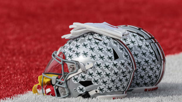 Nov 4, 2023; Piscataway, New Jersey, USA; Ohio State Buckeyes helmets rest on the field before the game against the Rutgers Scarlet Knights at SHI Stadium
