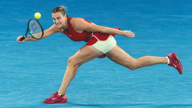 Aryna Sabalenka chases down a ball at the Australian Open.