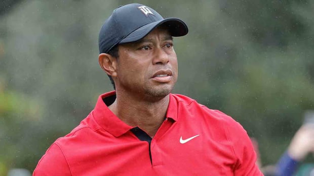Tiger Woods is pictured watching a shot at the 2023 PNC Championship at The Ritz-Carlton Golf Club.