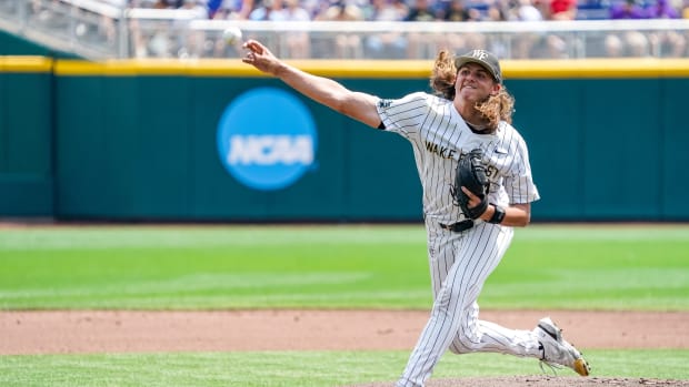 Jun 17, 2023; Omaha, NE, USA; Wake Forest Deacons starting pitcher Rhett Lowder (4) throws against the Stanford Cardinal during the first inning at Charles Schwab Field Omaha. Mandatory Credit: Dylan Widger-USA TODAY Sports  