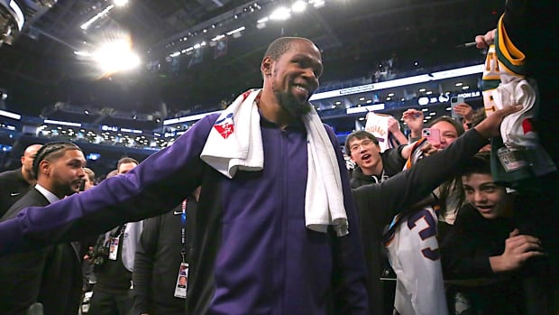 Jan 31, 2024; Brooklyn, New York, USA; Phoenix Suns forward Kevin Durant (35) smiles as he leaves the court after defeating the Brooklyn Nets at Barclays Center. Mandatory Credit: Brad Penner-USA TODAY Sports