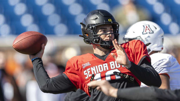 National quarterback Bo Nix of Oregon (10) throws the ball during practice for the National team at Hancock Whitney Stadium.