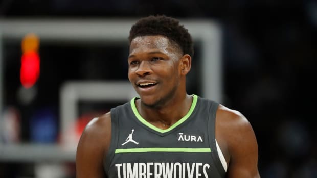 Jan 31, 2024; Minneapolis, Minnesota, USA; Minnesota Timberwolves guard Anthony Edwards (5) laughs after getting called for a foul in the first quarter of the game with the Dallas Mavericks at Target Center.