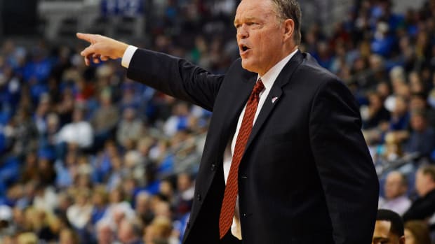 Nov 8, 2013; St. Louis, MO, USA; Southeast Missouri State Redhawks head coach Dickey Nutt signals to his team against the Saint Louis Billikens during the first half at Chaifetz Arena. Mandatory Credit: Jasen Vinlove-USA TODAY Sports