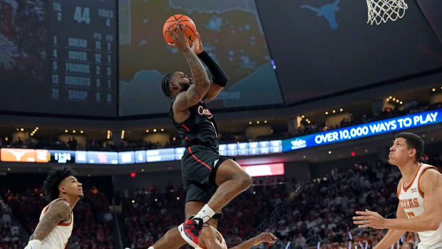 Jan 29, 2024; Austin, Texas, USA; Houston Cougars guard Jamal Shead (1) drives to the basket during the second half against the Texas Longhorns at Moody Center. Mandatory Credit: Scott Wachter-USA TODAY Sports