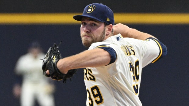 Milwaukee Brewers right-handed pitcher Corbin Burnes throws a pitch during a game against the St. Louis Cardinals.
