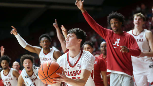Alabama guard Kai Spears (32) a walk on guard, takes a three late in the game at Coleman Coliseum.