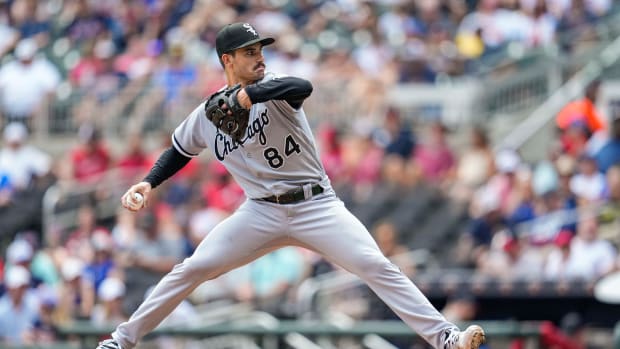 Jul 16, 2023; Cumberland, Georgia, USA; Chicago White Sox starting pitcher Dylan Cease (84) pitches against the Atlanta Braves during the fifth inning at Truist Park.